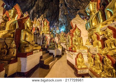 PINDAYA, MYANMAR - JANUARY 25, 2016 : Buddha statues inside the Shwe Umin Pagoda Paya, Myanmar. Pindaya Caves are a famous Buddhist pilgrimage site and a tourist attraction. HDR processed.