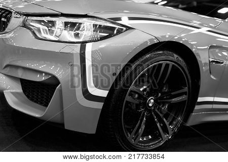 Sankt-Petersburg Russia July 21 2017: Front view of a BMW M4 sports car. M Performance Edition. Car exterior details. Black and white. Photo Taken at Royal Auto Show July 21