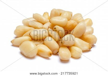 Organic Pine nuts isolated on white background