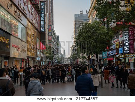 Wuhan Hubei China, 10 December 2017: Street view of Jianghan lu road the biggest pedestrian shopping street of Wuhan in China