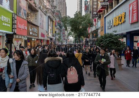 Wuhan Hubei China, 10 December 2017: Street view of Jianghan lu road the biggest pedestrian shopping street of Wuhan in China