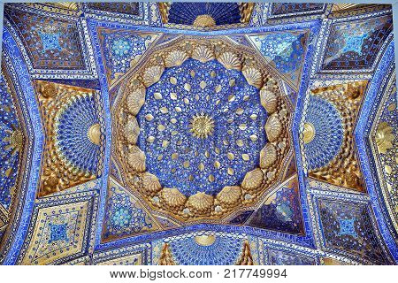 SAMARKAND, UZBEKISTAN - MAY 04, 2014 Golden interior of Aksaray mausoleum