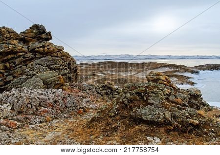 View above big beautiful lake and mountain in winter, Baikal lake, Russia, Siberia