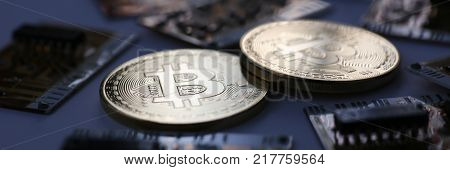 Coin crypto currency bitcoin against the background of a changing chart subject gold exchange pyramid for money in connection with the growth or fall exchange rate closeup.