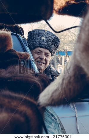 Zabolottia Ukraine - 20 January 2009: Man In Papakha At Local Market In Winter