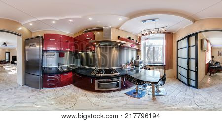 MINSK BELARUS - MARCH 25 2014: Panorama in interior stylish kitchen in modern flat in red color. Full 360 degree seamless panorama in equirectangular equidistant spherical projection