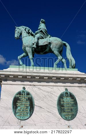 Statue of Frederick V by Jacques Franancis Joseph Saly at the centre of the Amalienborg Palace Square in Copenhagen Denmark