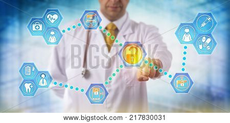 Unrecognizable doctor sharing health care data with medical staff via networked secure mobile devices. Healthcare IT concept for information exchange telemedicine and virtualization security.