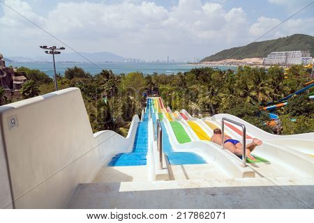 VINPEARL RESORT NHA TRANG VIETNAM - FEBRUARY 01 2015: The Multi Slide banana mat slides at Vinpearl Water Park Hon Tre Island Nha Trang Vietnam.