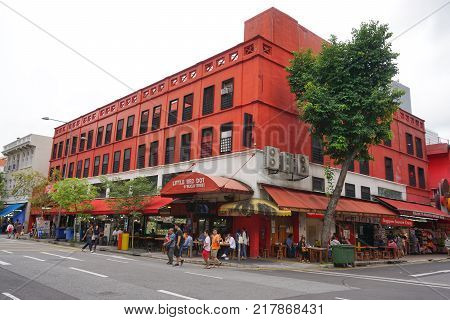 BUGIS SINGAPORE - 27 NOV 2107:  Many people walking in front of Little red dot building at Bugis Singapore