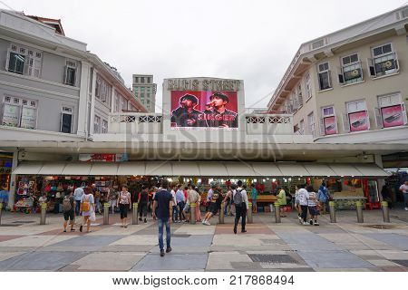BUGIS SINGAPORE - 27 NOV 2107: Many People walking and shopping in the Bugis Street. The Biggest market in Singapore