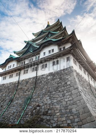 The main tower (Tenshu) of Nagoya Castle over blue sky