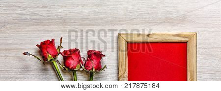 Valentine's Day. Happy Valentine's Day card, gift box and red rose on wood background, banner