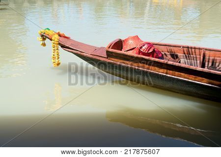 manual long tail boat is parking on the nature liver