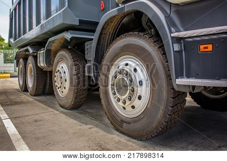 photo of wheels of brand new dump trucks