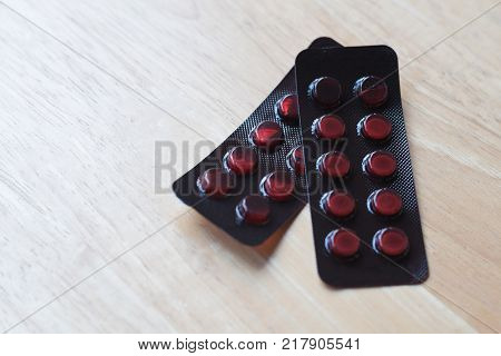 pills medicine in blister on table background