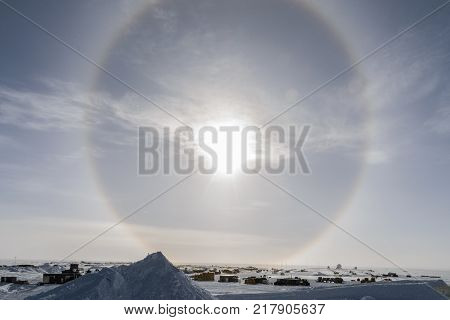 Sun Dog Shining Bright In The Sky Over Top Of The South Pole Station.