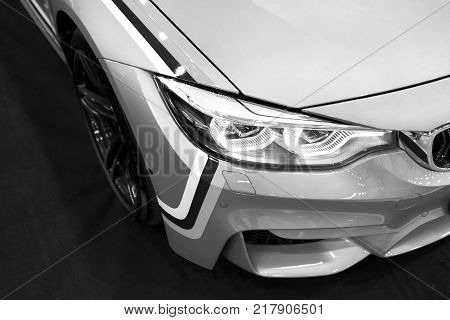 Sankt-Petersburg Russia July 21 2017: Front view of a BMW M4 sports car. M Performance Edition. Car exterior details. Black and white. Photo Taken at Royal Auto Show July 21