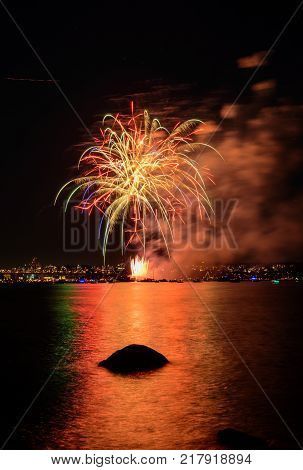 Celebration multicolored fireworks copy space. Canada Day holidays salute. New Year celebration colorful fireworks.