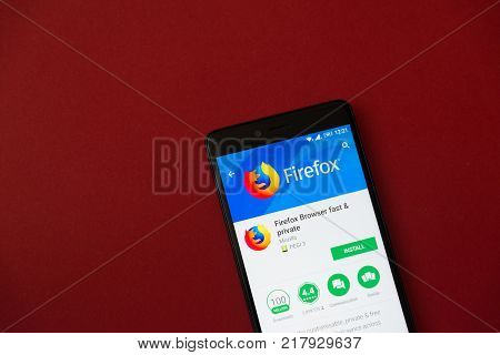 Los Angeles, december 11, 2017: Smartphone with Mozilla Firefox application in google play store on red background