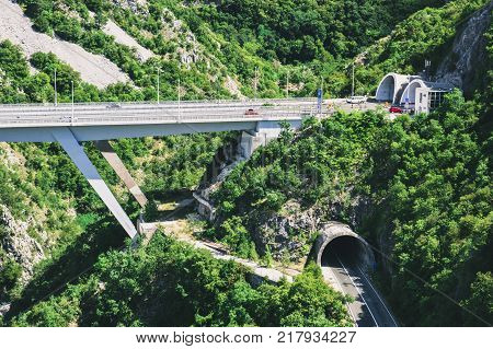Two mountain tunnel and bridge one over the other