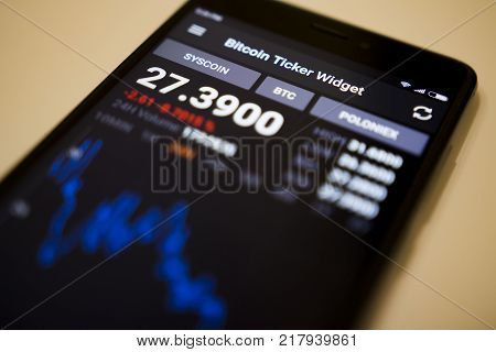 Berlin Germany - December 5 2017: Exchange rate of SYSCOIN crypto currency in Bitcoin Ticker Widget application on screen of modern smartphone