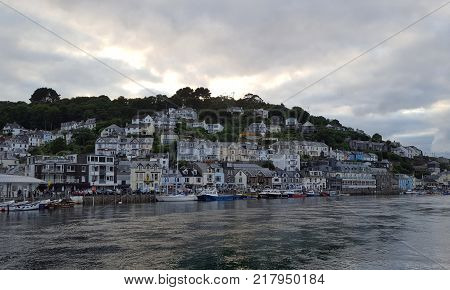 The Cornish fishing village of Looe as the sun starts to set