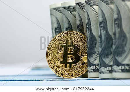 Bitcoin golden coin New virtual money and dollar background . Cryptocurrency. Business and Trading concept.