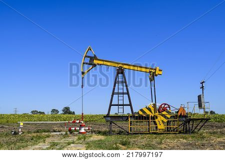 The Pumping Unit As The Oil Pump Installed On A Well. Equipment Of Oil Fields.