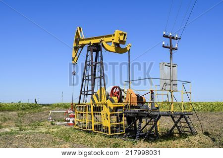 The Pumping Unit As The Oil Pump Installed On A Well. Equipment Of Oil Fields.