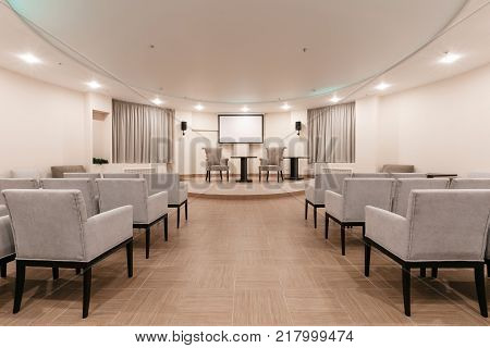 Row of chairs in boardroom. seats in an empty conference room.