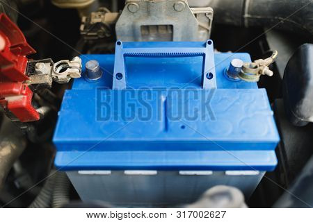 new lead-acid automotive electric battery replacement in old car