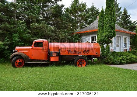 Lowry, Minnesota, July 28, 2019: An Old Gas Truck Bearing The Phillips 66 Sign Represents Company  H