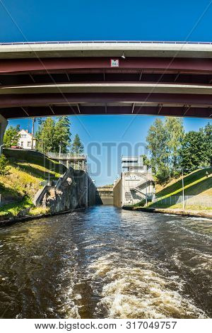 Lappeenranta, Finland - August 7, 2019: Lock And Bridge On The Saimaa Canal At Malkia. View From Wat