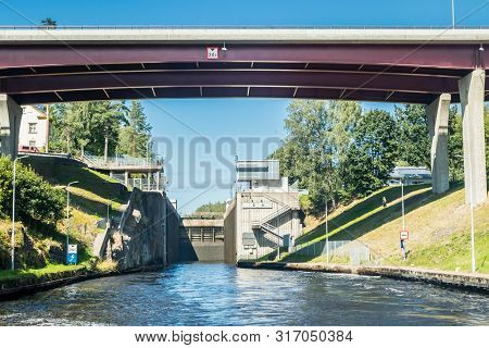 Lappeenranta, Finland - August 7, 2019: Lock And Bridge On The Saimaa Canal At Malkia. View From Wat