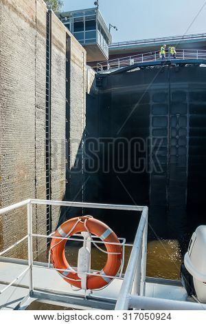 Lappeenranta, Finland - August 7, 2019: Lock And Bridge On The Saimaa Canal At Malkia. Engineers Are