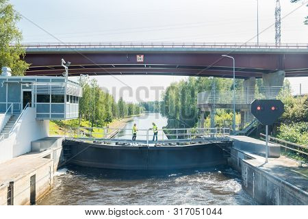 Lappeenranta, Finland - August 7, 2019: Lock And Bridge On The Saimaa Canal At Malkia. Engineers Are