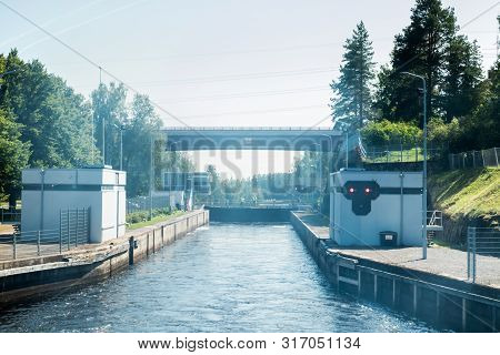 Lappeenranta, Finland - August 7, 2019: Lock And Bridge On The Saimaa Canal At Malkia. Engineers Are