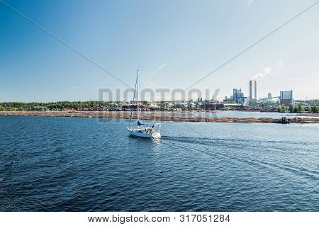 Lappeenranta, Finland - August 7, 2019: Yacht And Upm Factory In Lappeenranta, Finland