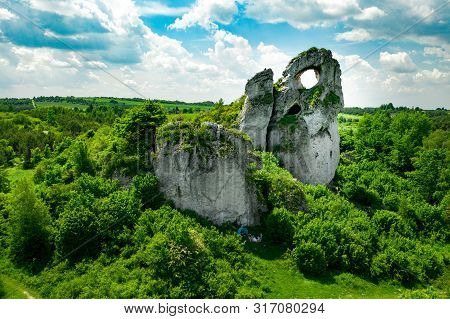 A Panoramic View Of The Unique Okiennik Rock In Poland With A Large Natural Window