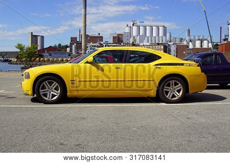 Karlshamn, Sweden - July 26, 2019: Yellow Dodge Charger Hemi Daytona Parked On A Public Parking Lot.