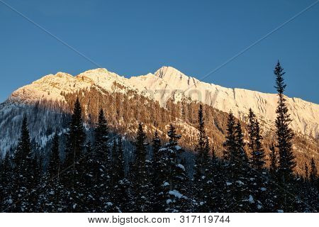 Sunset In The Mountains Of Spray Valley Provincial Park In Kananaskis, Alberta, Canada