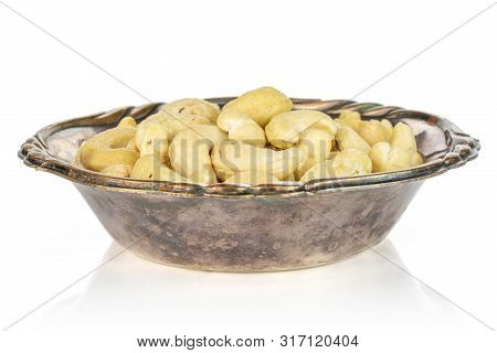 Lot Of Whole Unsalted Beige Cashew In Metal Bowl Isolated On White Background