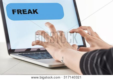 Cropped View Of Girl Typing On Laptop Keyboard With Fresk Message On Screen, Cyberbullying Concept