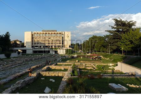 Stara Zagora, Bulgaria - August 5, 2018: Sunset View Of Regional Library And Ruins Of Ancient August