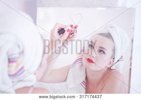 Attractive Young Woman Wrapped With Bath Towel After A Shower At The Bathroom.