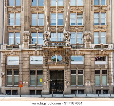 Antwerpen, Belgium - June 23, 2019: Entrance To Beige-brown Facade Of Monumental Diamond Exchange Bu