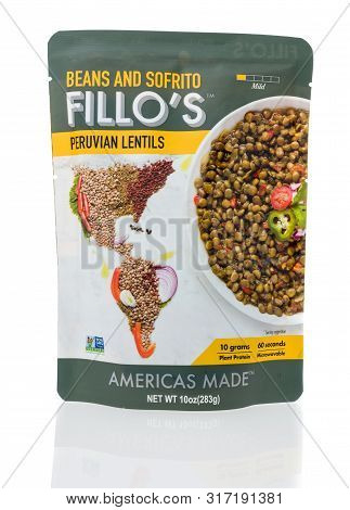 Winneconne, Wi - 4 August 2019 : A Package Of  Fillos Beans And Sorfito Peruvian Lentils On An Isola