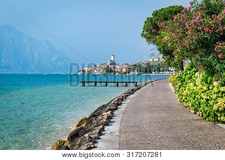 Malcesine, Italy - July 24, 2019: A Foot And Cycle Path That Leads To Malcesine Village On Lake Gard