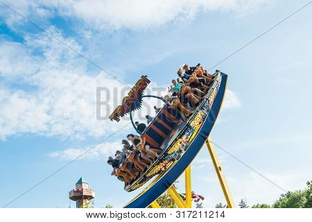 Kouvola, Finland - 10 August 2019: Ride Trombi In Motion On Sky Background In Amusement Park Tykkima